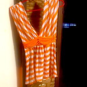 Orange and white sleeveless top